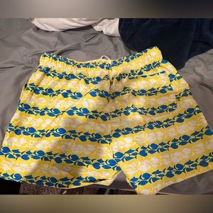 Men’s yellow, blue and white fish swim trunks
